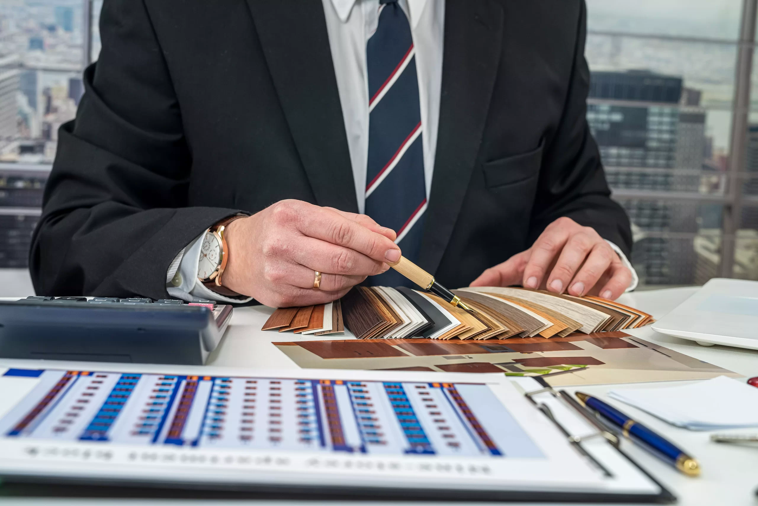 AnyConv.com__designer-selects-color-walls-new-apartment-from-drawing-he-holds-his-hand